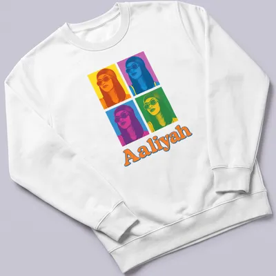 Retro pop art t-shirt featuring the name Aaliyah in bright colors — printed on a unisex sweatshirt
