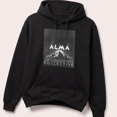 Retro halftone design of mountains and sunrise with 'ALMA COLLECTIVE' text — printed on a unisex hoodie