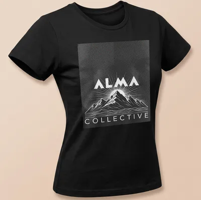 Retro halftone design of mountains and sunrise with 'ALMA COLLECTIVE' text — printed on a women's shirt