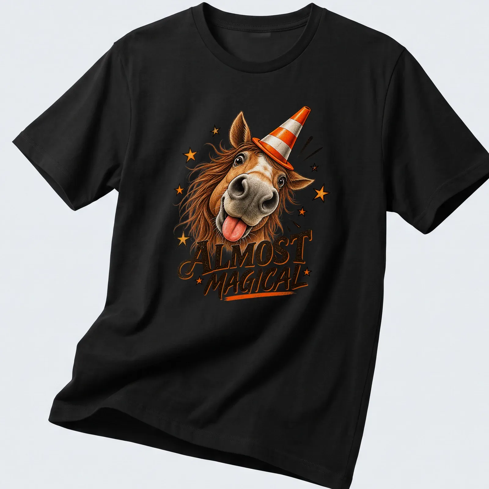 Colorful cartoon horse in a party hat, surrounded by stars and the text Almost Magical — printed on a unisex t-shirt