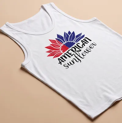 Bold illustration of an American sunflower in red, white, and blue colors — printed on a tank top