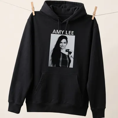 Black and white portrait of Amy Lee with bold lettering underneath — printed on a unisex hoodie
