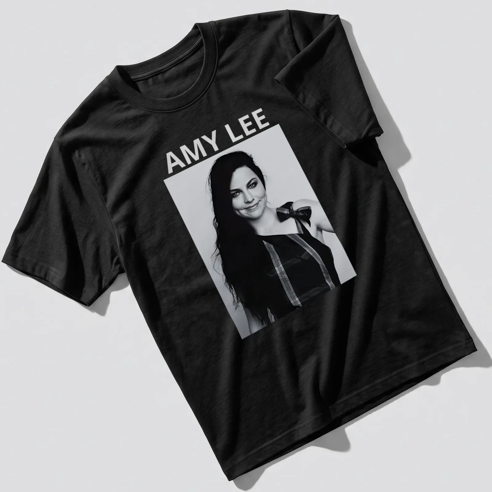 Black and white portrait of Amy Lee with bold lettering underneath — printed on a unisex t-shirt