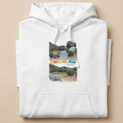 Colorful illustration of a scenic landscape depicting water and rocks with text "ANGOURIE, NSW" — printed on a unisex hoodie