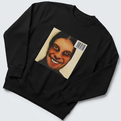 Digital art of a smiling face in brown, black, and white shades — printed on a unisex sweatshirt