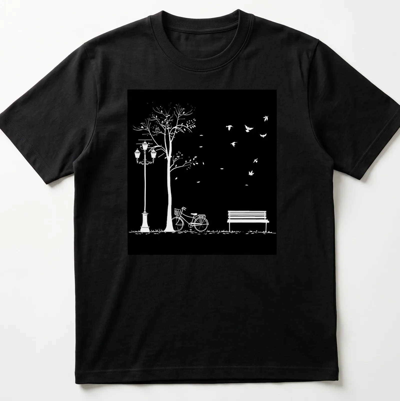 Minimalist black and white illustration of a bicycle, bench, lamppost, tree, and birds. — printed on a unisex t-shirt
