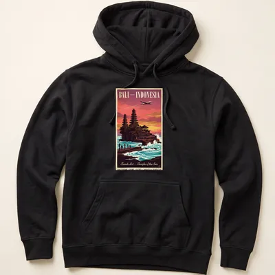 Vintage style T-shirt featuring Tanah Lot Temple in Bali with vibrant sunset colors — printed on a unisex hoodie