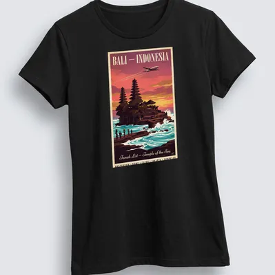Vintage style T-shirt featuring Tanah Lot Temple in Bali with vibrant sunset colors — printed on a women's shirt