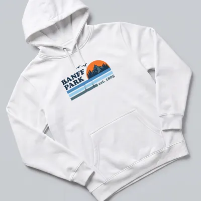 Vintage style t-shirt featuring a mountain sunset with trees in orange and blue — printed on a unisex hoodie