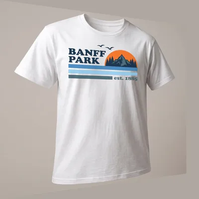 Vintage style t-shirt featuring a mountain sunset with trees in orange and blue — printed on a unisex t-shirt (angled view)