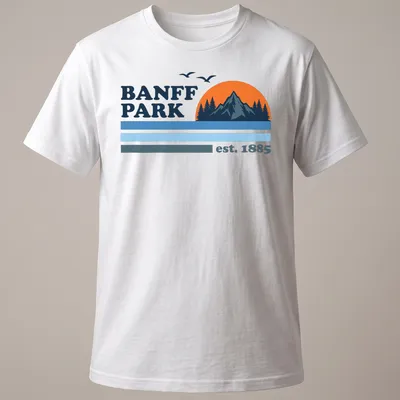 Vintage style t-shirt featuring a mountain sunset with trees in orange and blue — printed on a unisex t-shirt