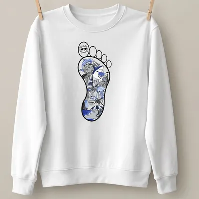 Illustrative beach footprint with ocean elements in blue, black, and gray — printed on a unisex sweatshirt