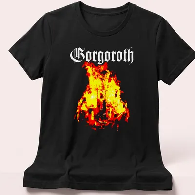 Grunge style tee featuring a fire silhouette and the word 'Sorcery' in bold text — printed on a women's shirt