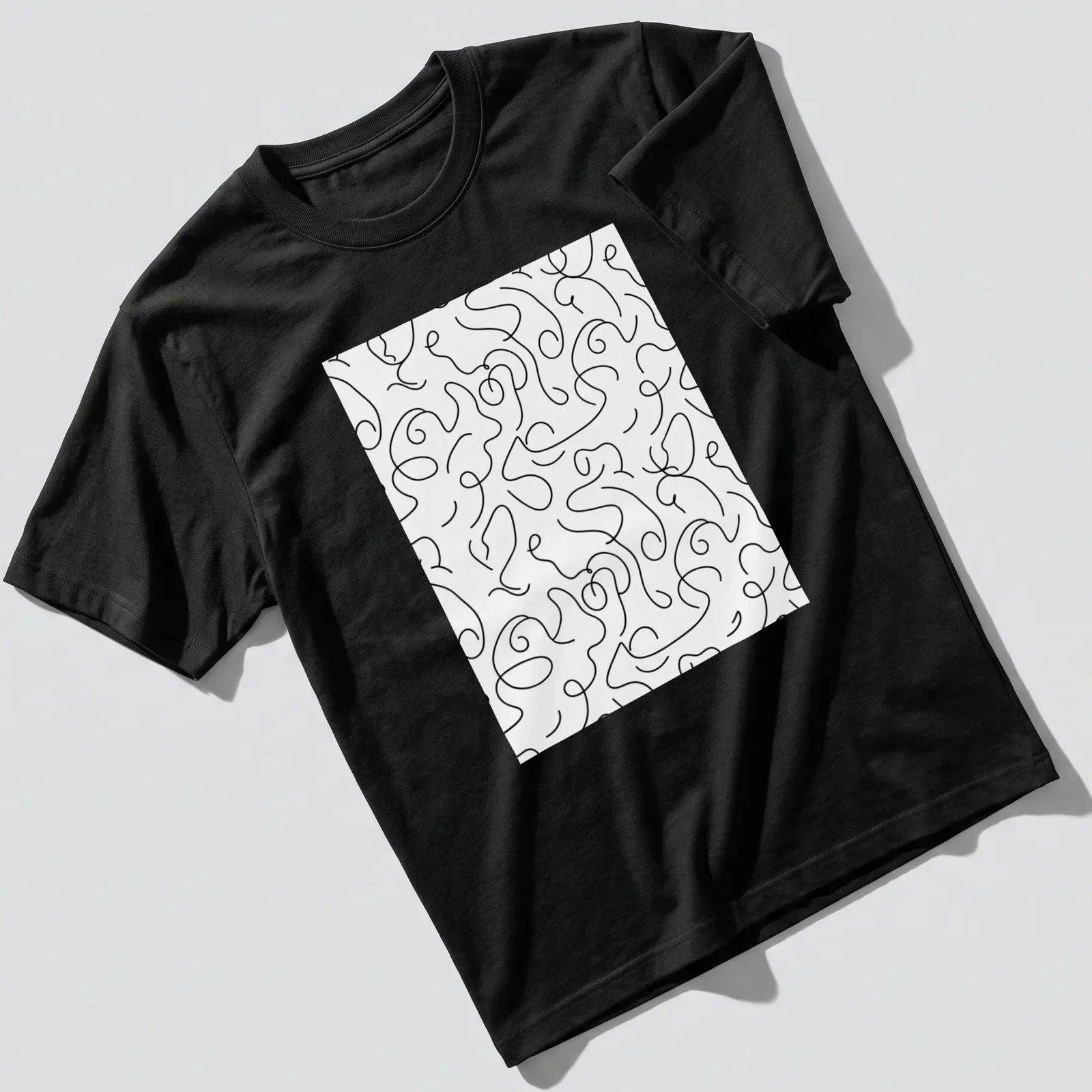 Abstract black and white line patterns in a minimalist design. — printed on a unisex t-shirt