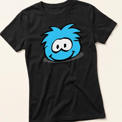 Cartoon blue puffle character with cute face design — printed on a women's shirt