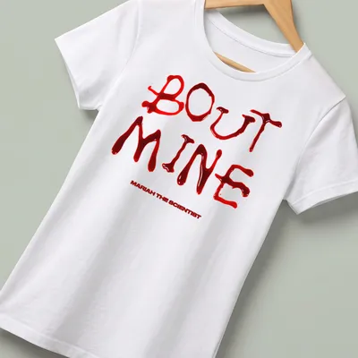 Bold blood typography T-shirt featuring 'BOUT MINE MARIAH THE SCIENTIST' in red and white — printed on a women's shirt