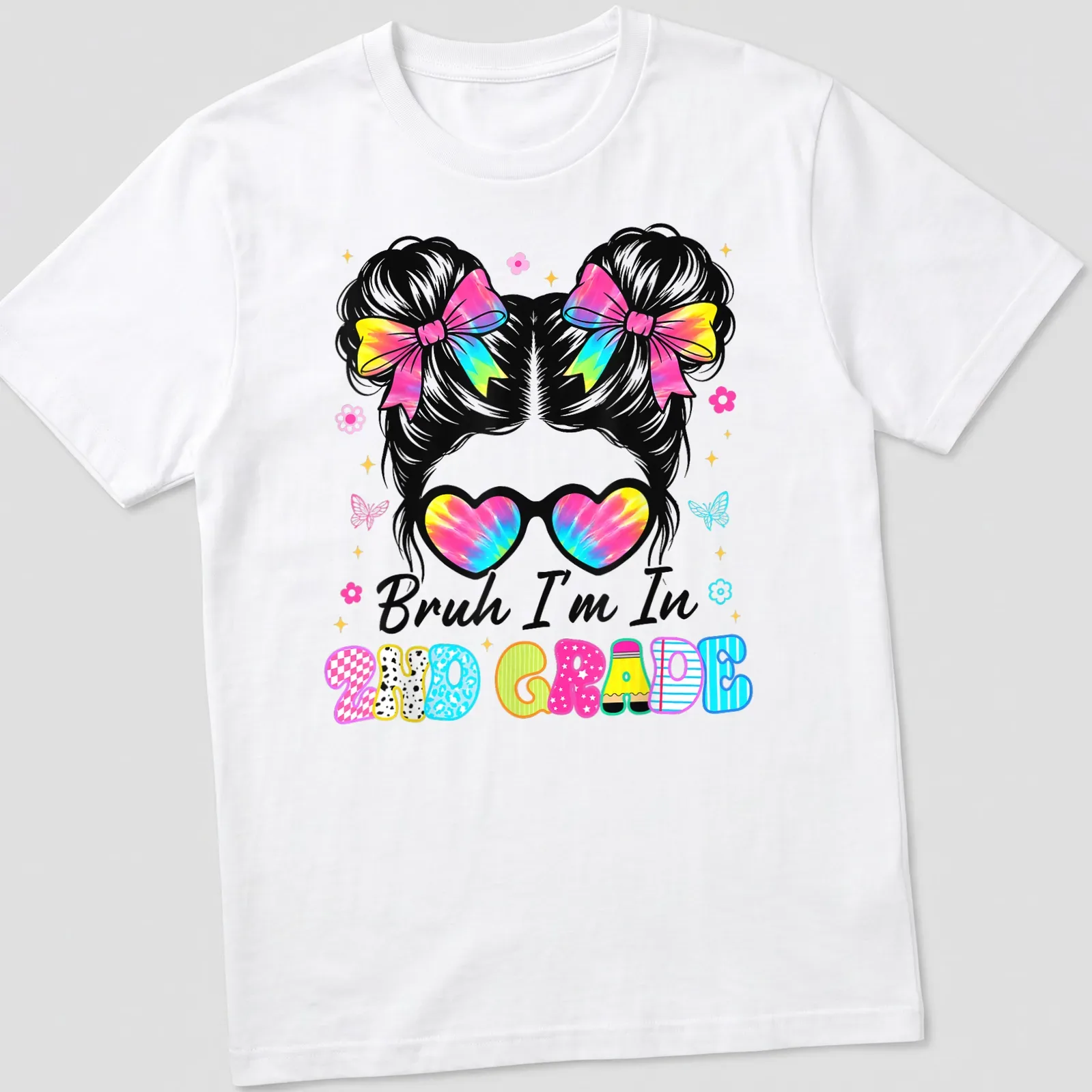 Colorful cartoon t-shirt featuring a girl with a messy bun and the phrase Bruh I'm In 2Nd Grade. — printed on a unisex t-shirt