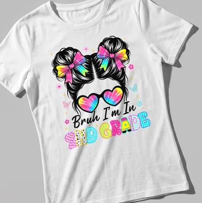 Colorful cartoon t-shirt featuring a girl with a messy bun and the phrase Bruh I'm In 2Nd Grade. — printed on a women's shirt