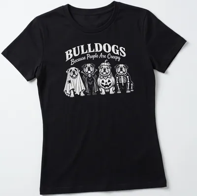 Playful cartoon bulldogs in Halloween costumes with humorous text — printed on a women's shirt