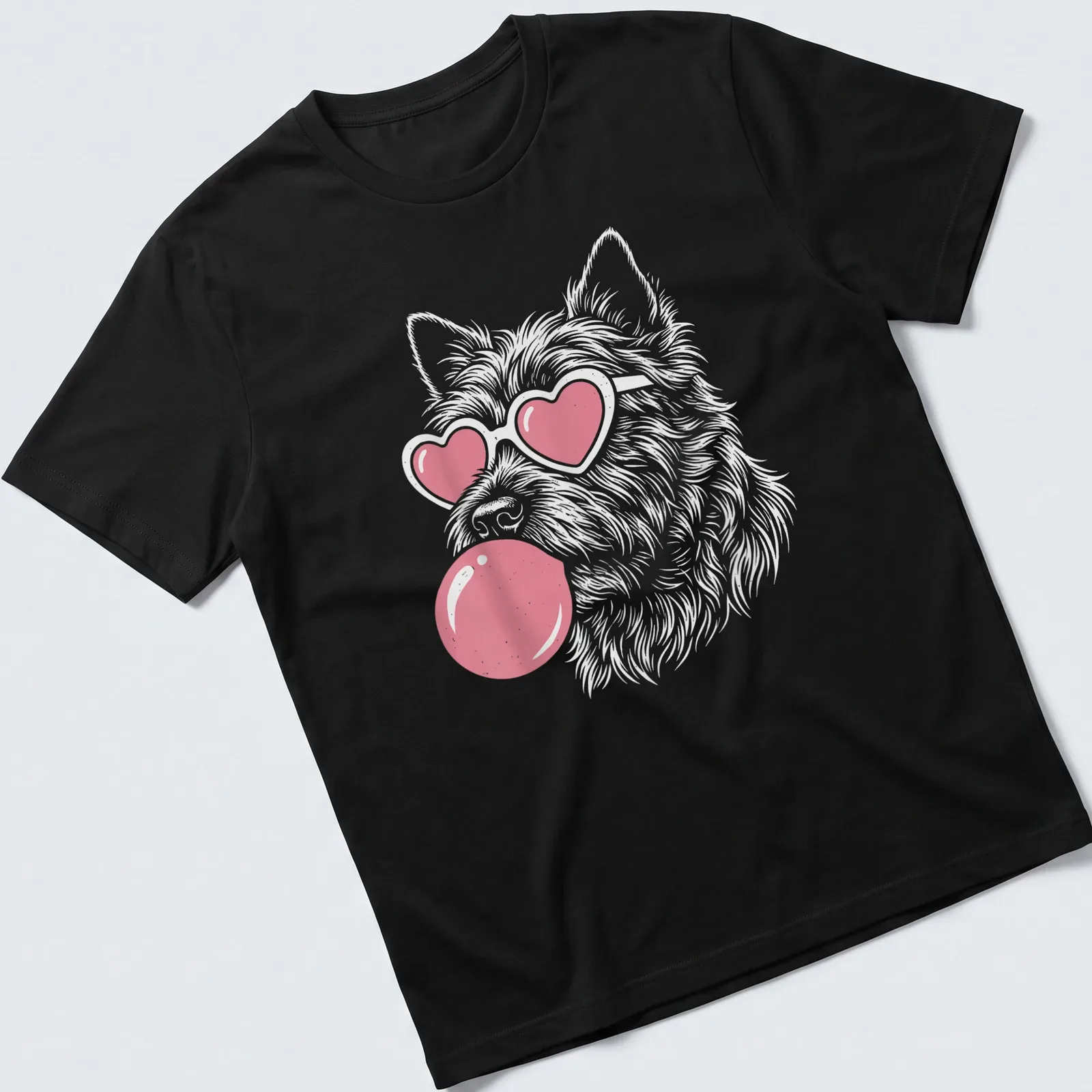 Playful illustration of a Cairn Terrier dog blowing bubble gum with heart sunglasses — printed on a unisex t-shirt