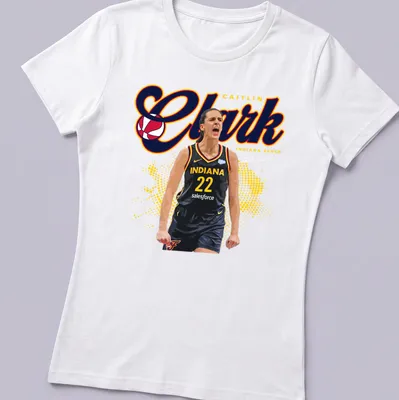 Bold graphic featuring Caitlin Clark playing basketball in red, yellow, black, and white — printed on a women's shirt