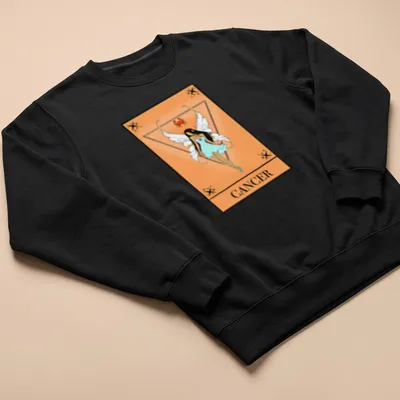 Illustrative Cancer Tarot fairy design with peach and light blue colors — printed on a unisex sweatshirt
