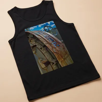 Vintage T-shirt featuring a Case tractor with the text D 400 E in rustic colors — printed on a tank top
