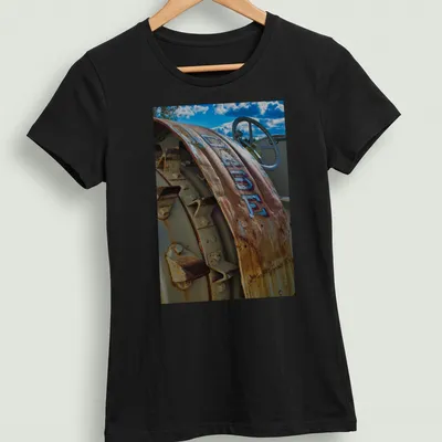 Vintage T-shirt featuring a Case tractor with the text D 400 E in rustic colors — printed on a women's shirt