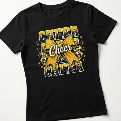 Yellow glitter t-shirt with bold lettering 'CHEER CHEER CHEER' and a cheer bow graphic — printed on a women's shirt