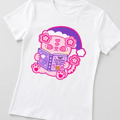 Kawaii style pink cat illustration with text for Christmas cat treat recipes — printed on a women's shirt