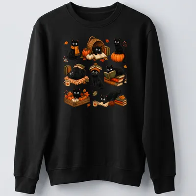 Whimsical illustration of black cats reading books among pumpkins in autumn colors — printed on a unisex sweatshirt
