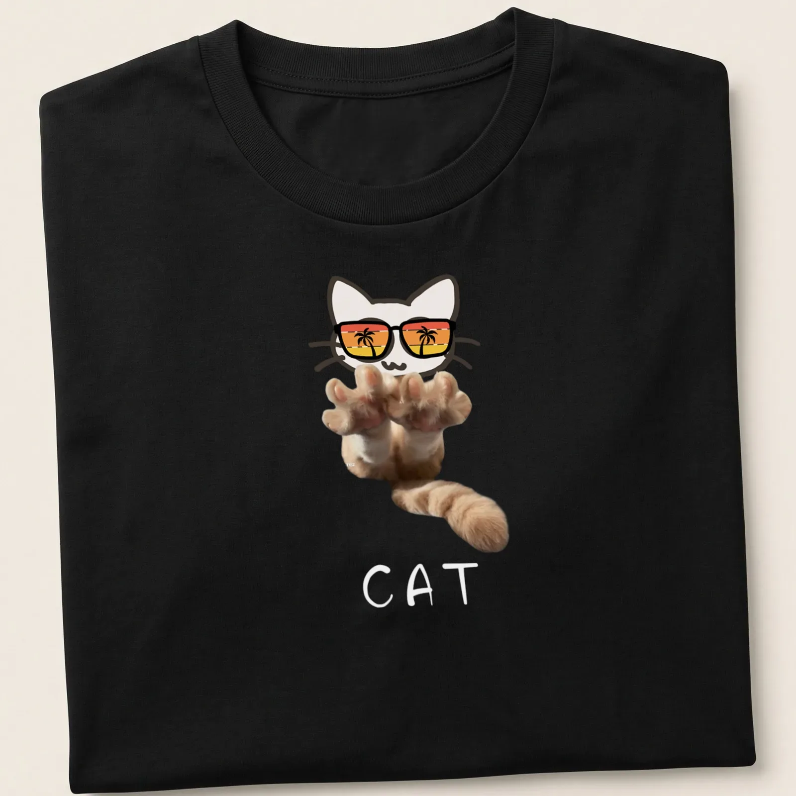 Kawaii line-art of a cute kitten with sunglasses and a paw design — printed on a unisex t-shirt