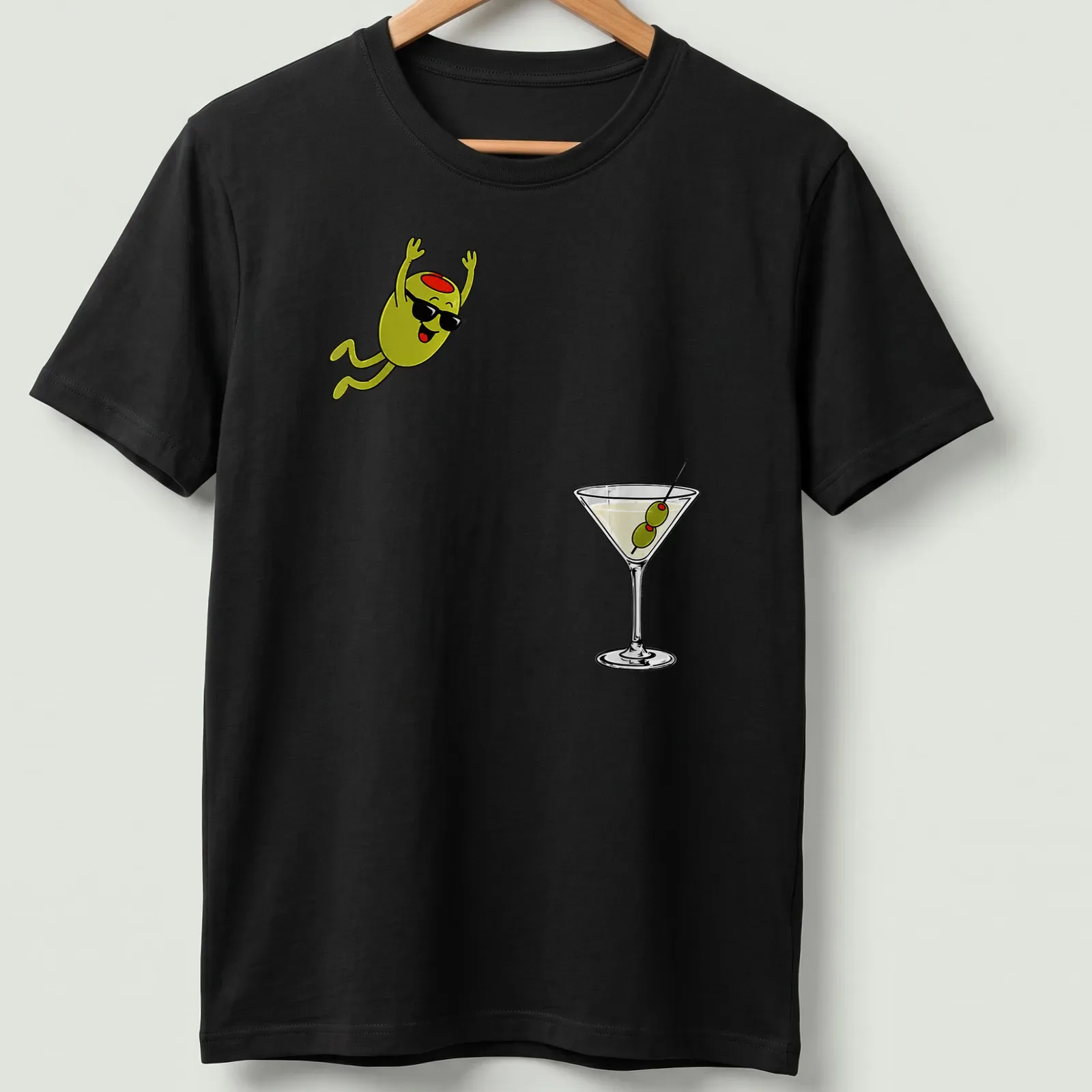 Cartoon olive diving into a dirty martini cocktail, illustrated in green, black, white, and red — printed on a unisex t-shirt