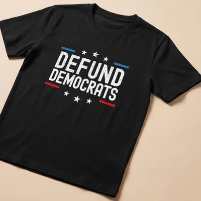 Bold red, blue, and white shirt with distressed text reading DEFUND DEMOCRATS