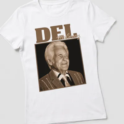 Vintage T-shirt featuring Del McCoury in brown and beige tones — printed on a women's shirt