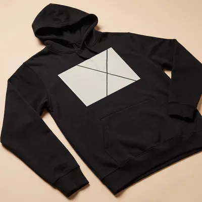 Minimalist T-shirt featuring diagonal lines in cream and black. — printed on a unisex hoodie