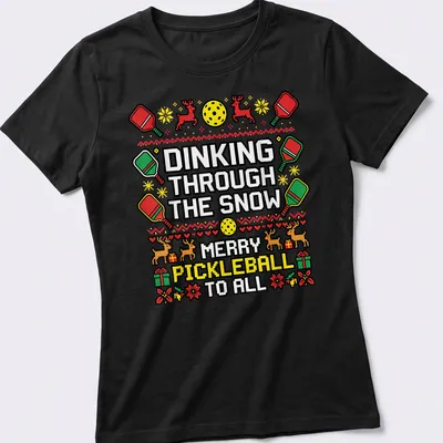 Ugly Christmas sweater design featuring pickleball paddles and reindeer — printed on a women's shirt