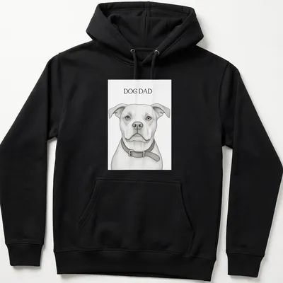 Sketch-style Dog Dad t-shirt featuring a playful dog illustration in monochrome — printed on a unisex hoodie