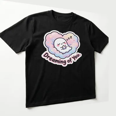 Kawaii ghost peeking from cloud with pastel colors and text Dreaming of You. — printed on a unisex t-shirt (angled view)