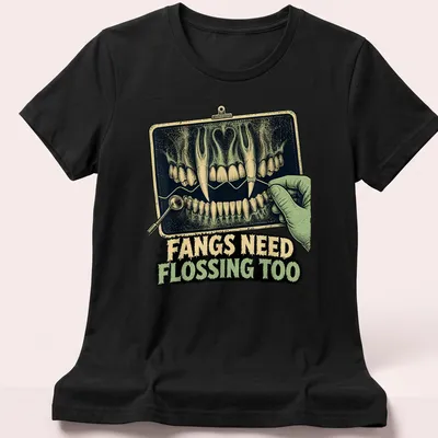 Vintage illustration of vampire teeth and dental tools with humorous text — printed on a women's shirt