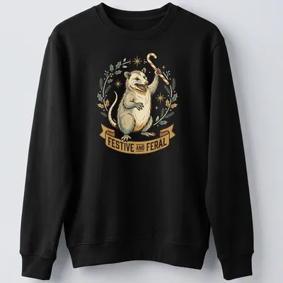 Vintage illustration of a festive opossum holding a candy cane with whimsical text above. — printed on a unisex sweatshirt