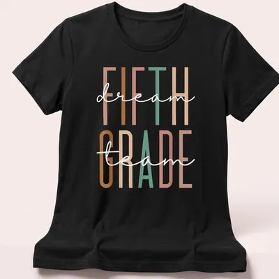 Modern typography shirt with 'Fifth Dream Grade' in vibrant colors — printed on a women's shirt