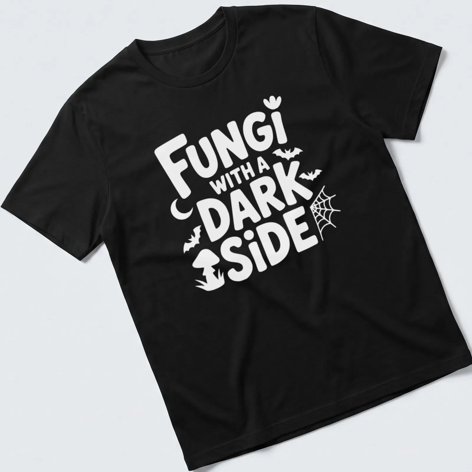 Gothic typography and mushroom illustrations on a dark aesthetic tee. — printed on a unisex t-shirt