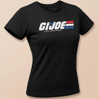 Bold graphic t-shirt featuring the G.I. Joe logo in red, white, and blue — printed on a women's shirt