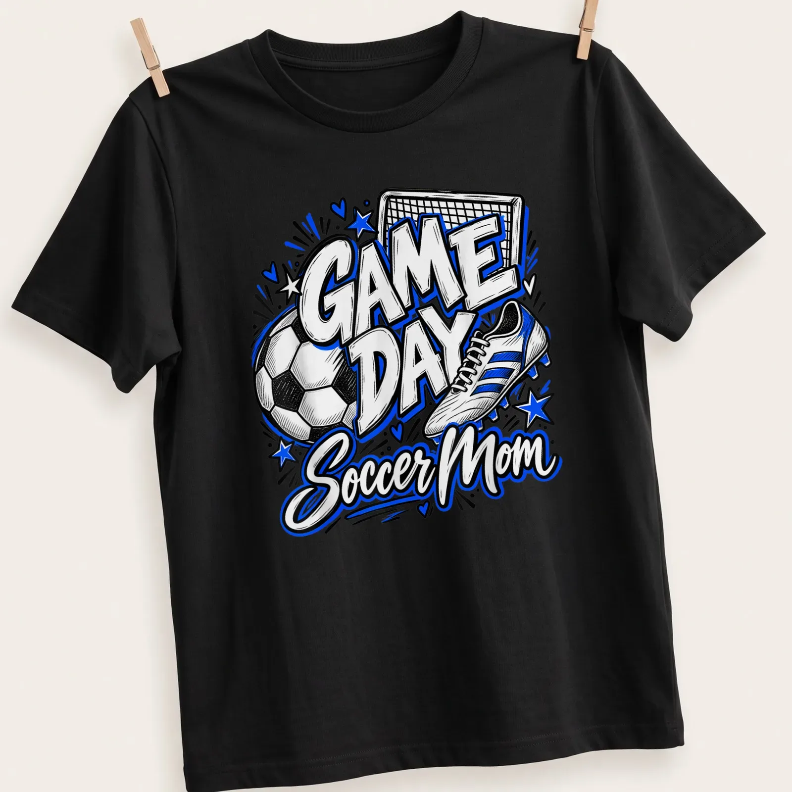 Bold hand-drawn print reading 'GAME DAY Soccer Mom' with a soccer ball and shoe — printed on a unisex t-shirt