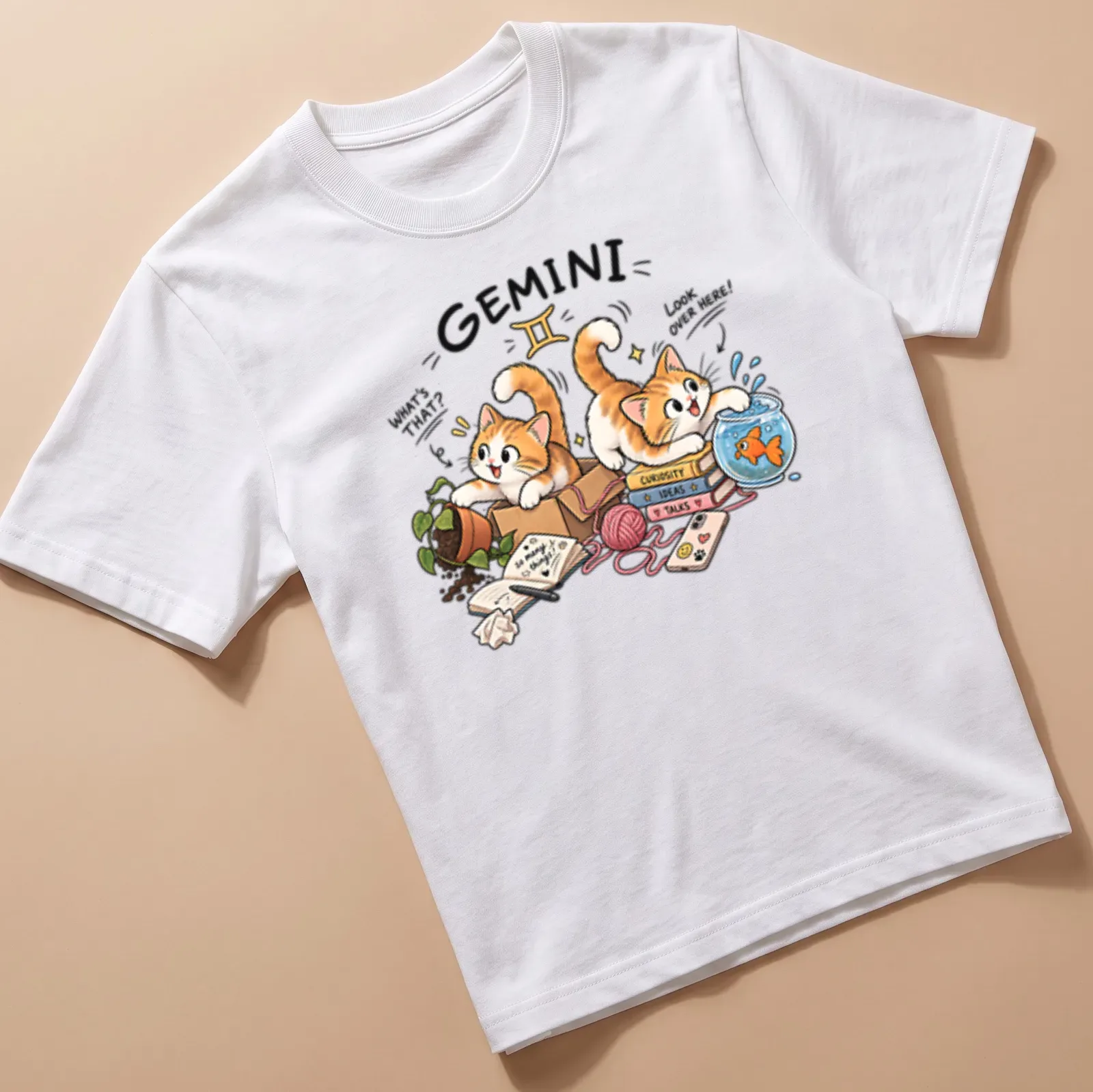 Kawaii illustration of curious cats with a fish bowl and playful text — printed on a unisex t-shirt