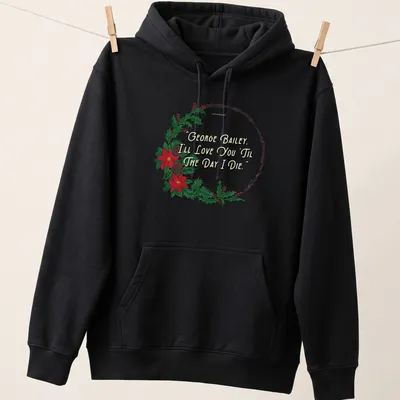 Watercolor Christmas t-shirt featuring a wreath and text about love. — printed on a unisex hoodie