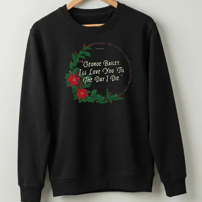 Watercolor Christmas t-shirt featuring a wreath and text about love. — printed on a unisex sweatshirt