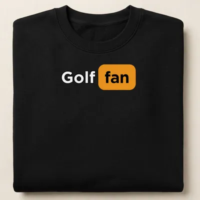 Bold modern Golf Fan t-shirt with striking typography in black and orange — printed on a unisex sweatshirt