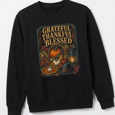 Vintage Thanksgiving T-shirt with 'Grateful Thankful Blessed' text and harvest illustration — printed on a unisex sweatshirt